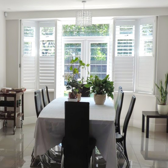 modern window shutters in a dining room