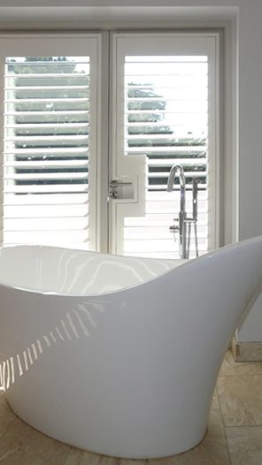 Water proof shutters for bathroom window in show home