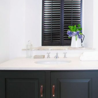 Just Shutters Wimbledon fitted beautiful black shutters in bathroom
